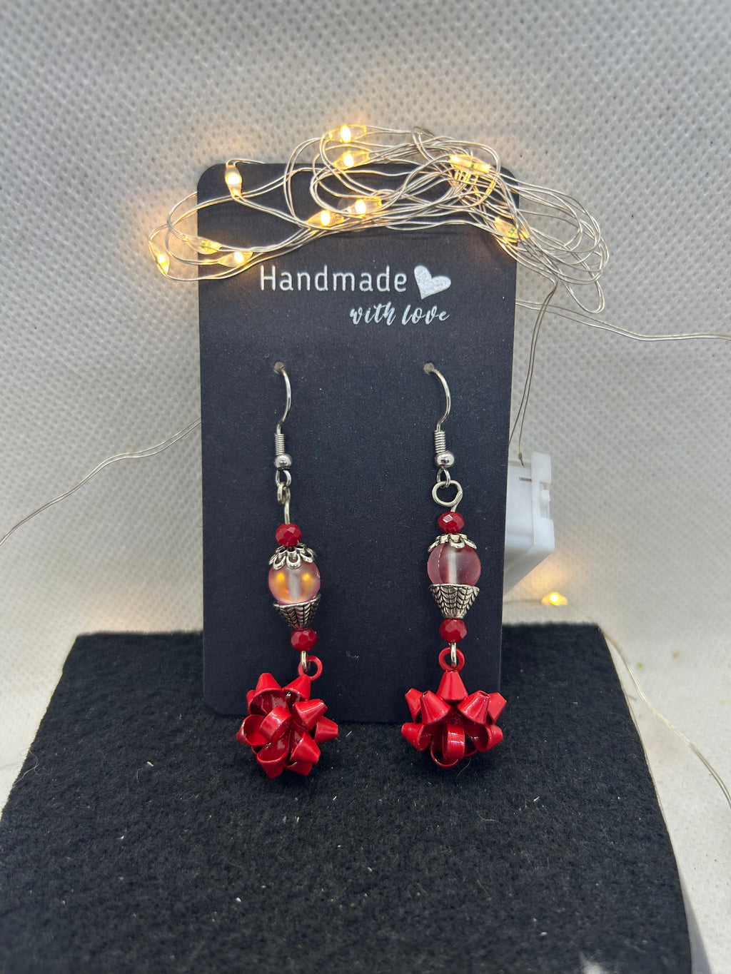 Red Bow and Glowing Beaded Earrings