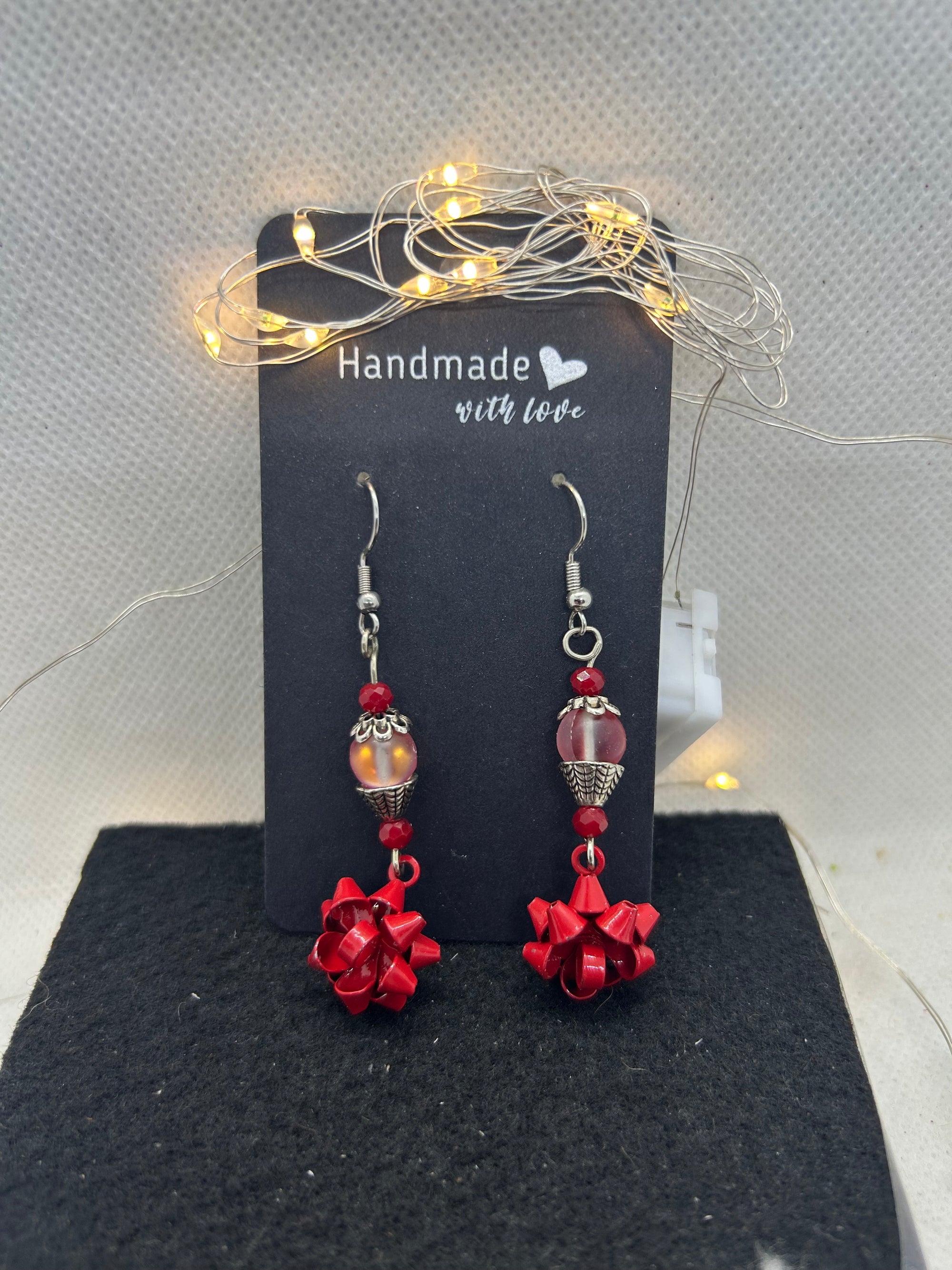 Red Bow and Glowing Beaded Earrings