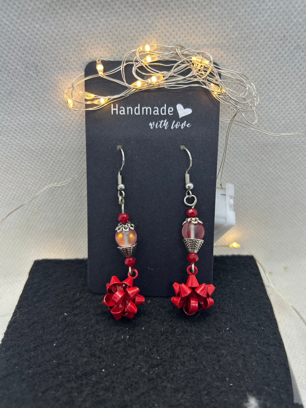 Red Bow and Glowing Beaded Earrings