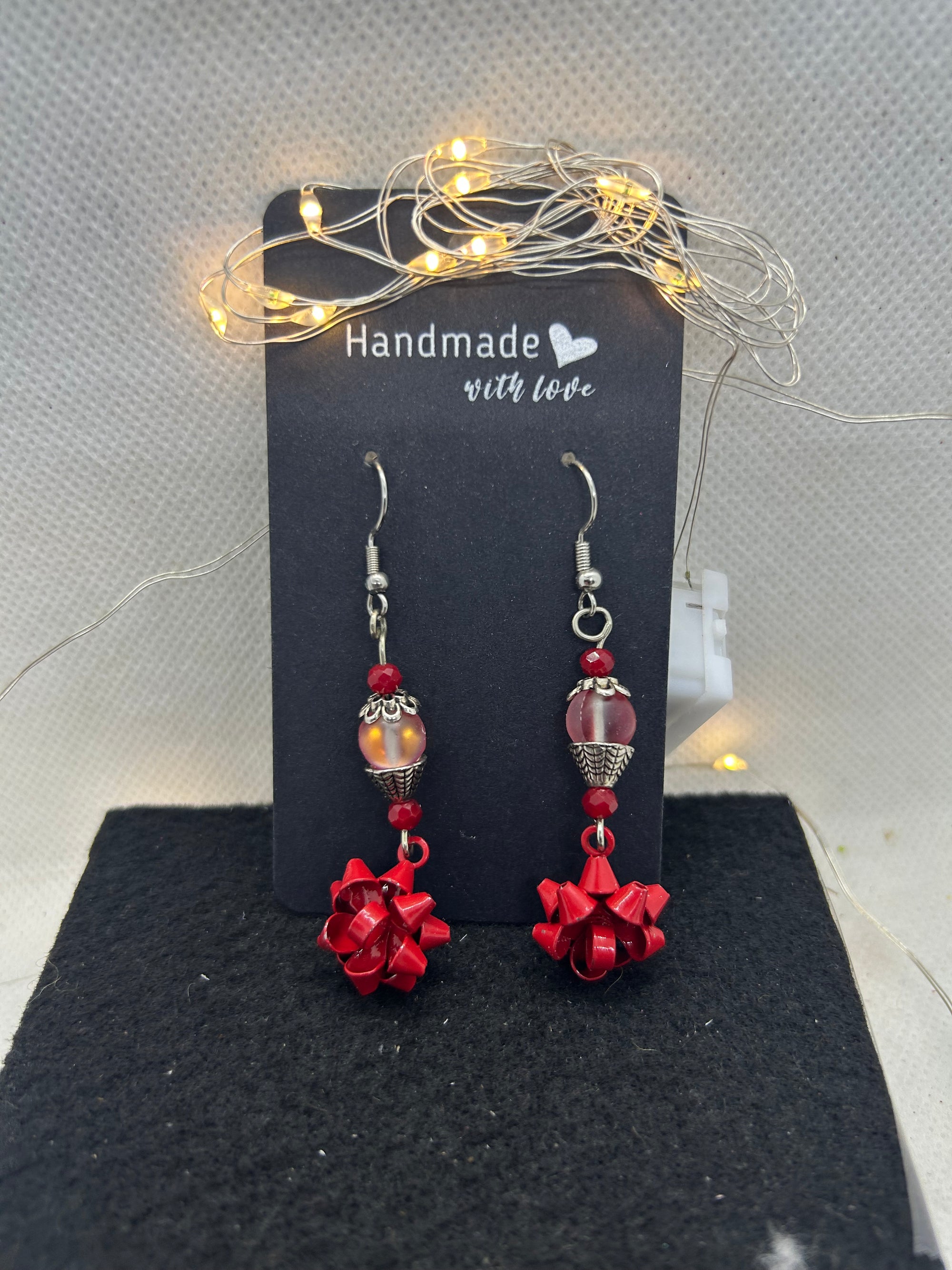 Red Bow and Glowing Beaded Earrings