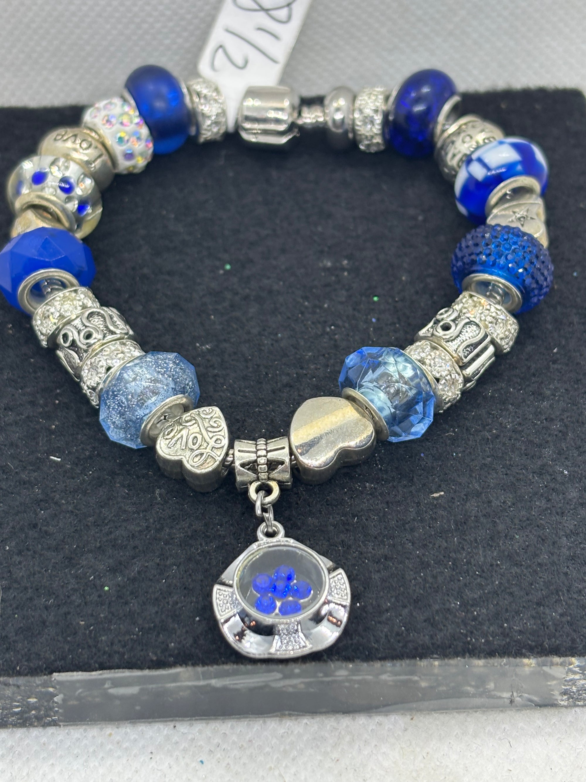 Blue Spinning Rhinestone Flower Charm Bracelet