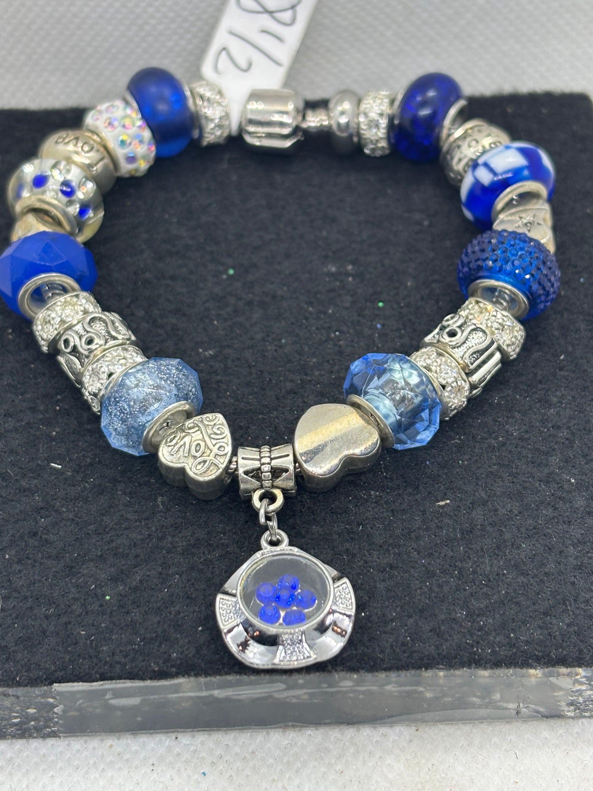 Blue Spinning Rhinestone Flower Charm Bracelet