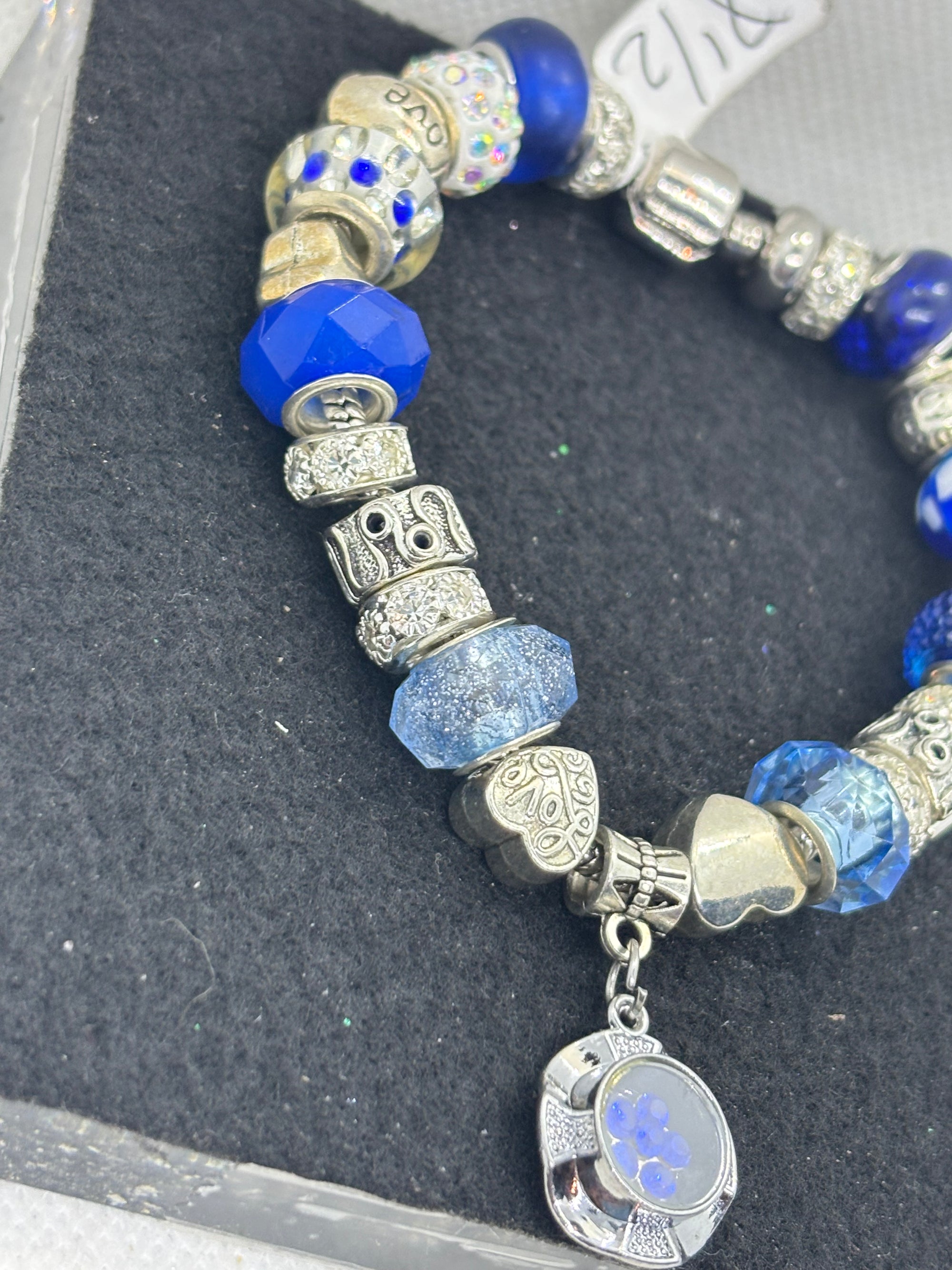 Blue Spinning Rhinestone Flower Charm Bracelet