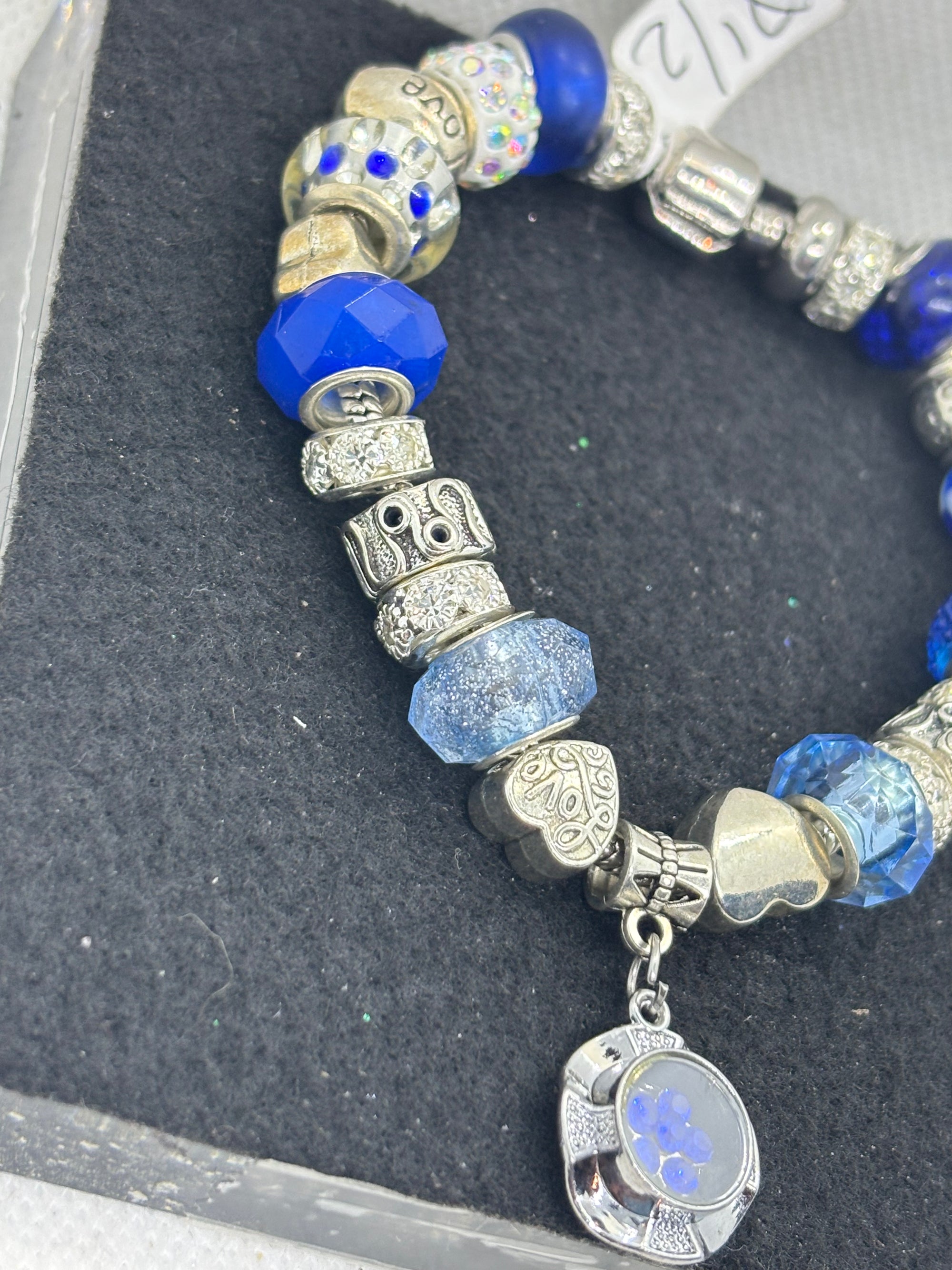 Blue Spinning Rhinestone Flower Charm Bracelet