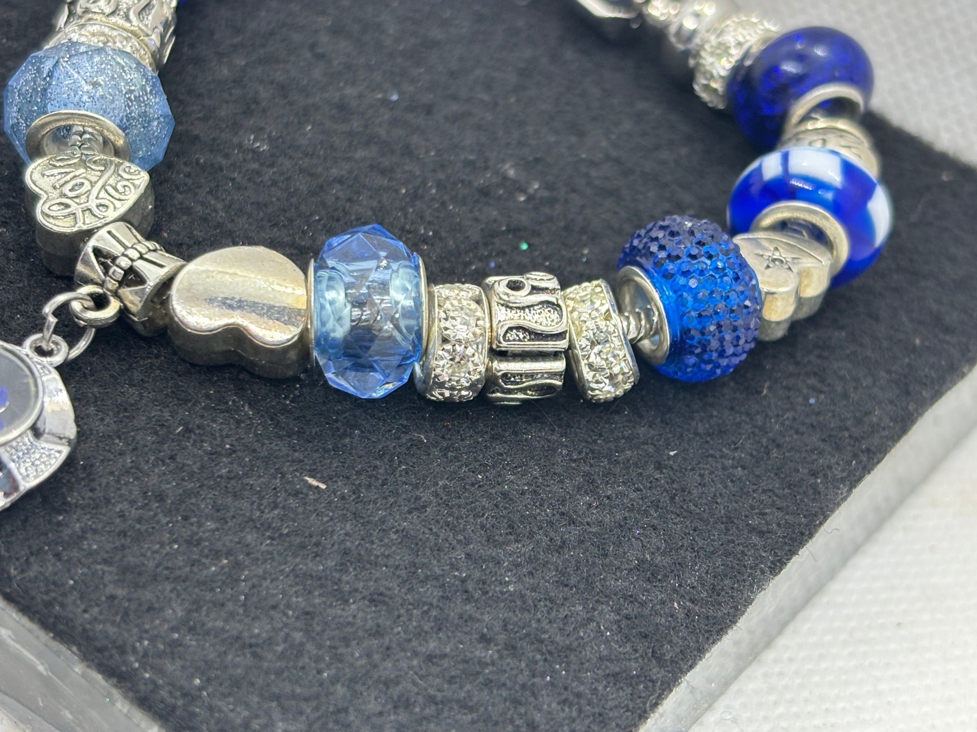 Blue Spinning Rhinestone Flower Charm Bracelet