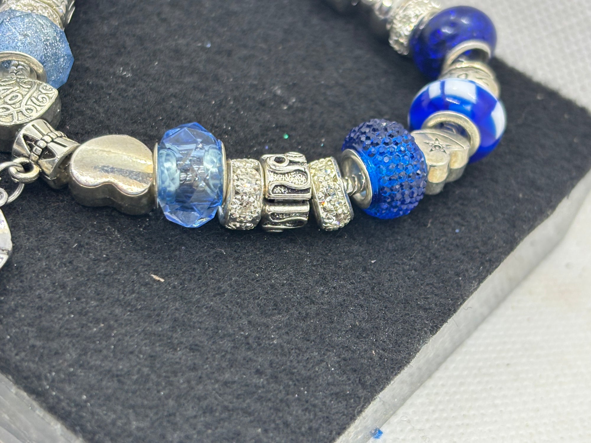 Blue Spinning Rhinestone Flower Charm Bracelet