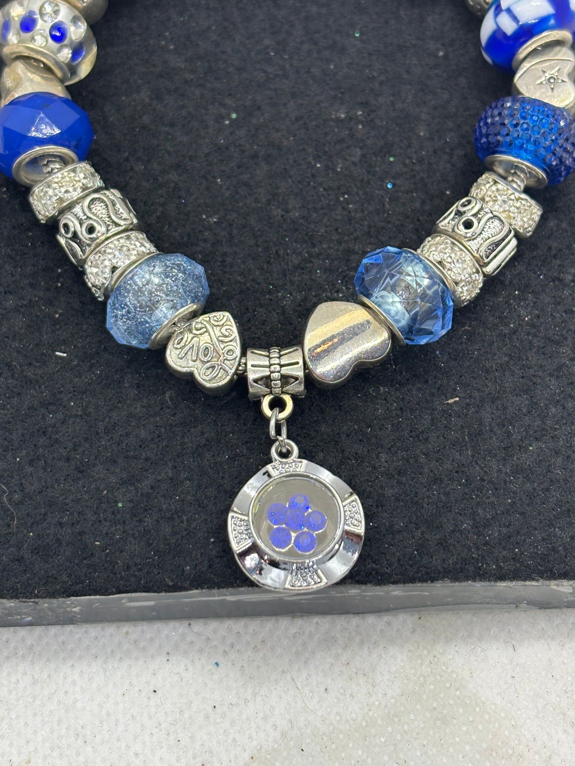 Blue Spinning Rhinestone Flower Charm Bracelet