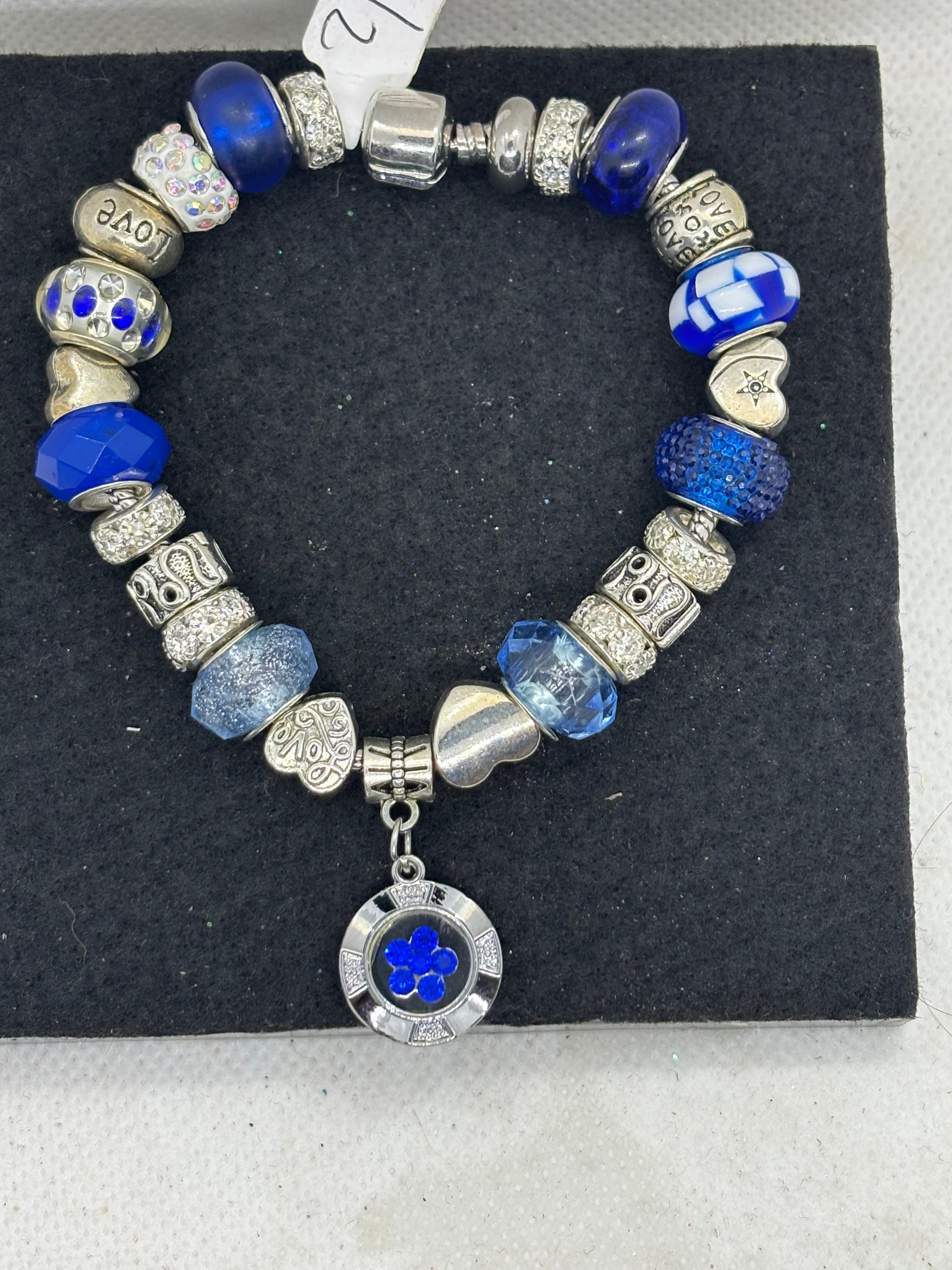 Blue Spinning Rhinestone Flower Charm Bracelet