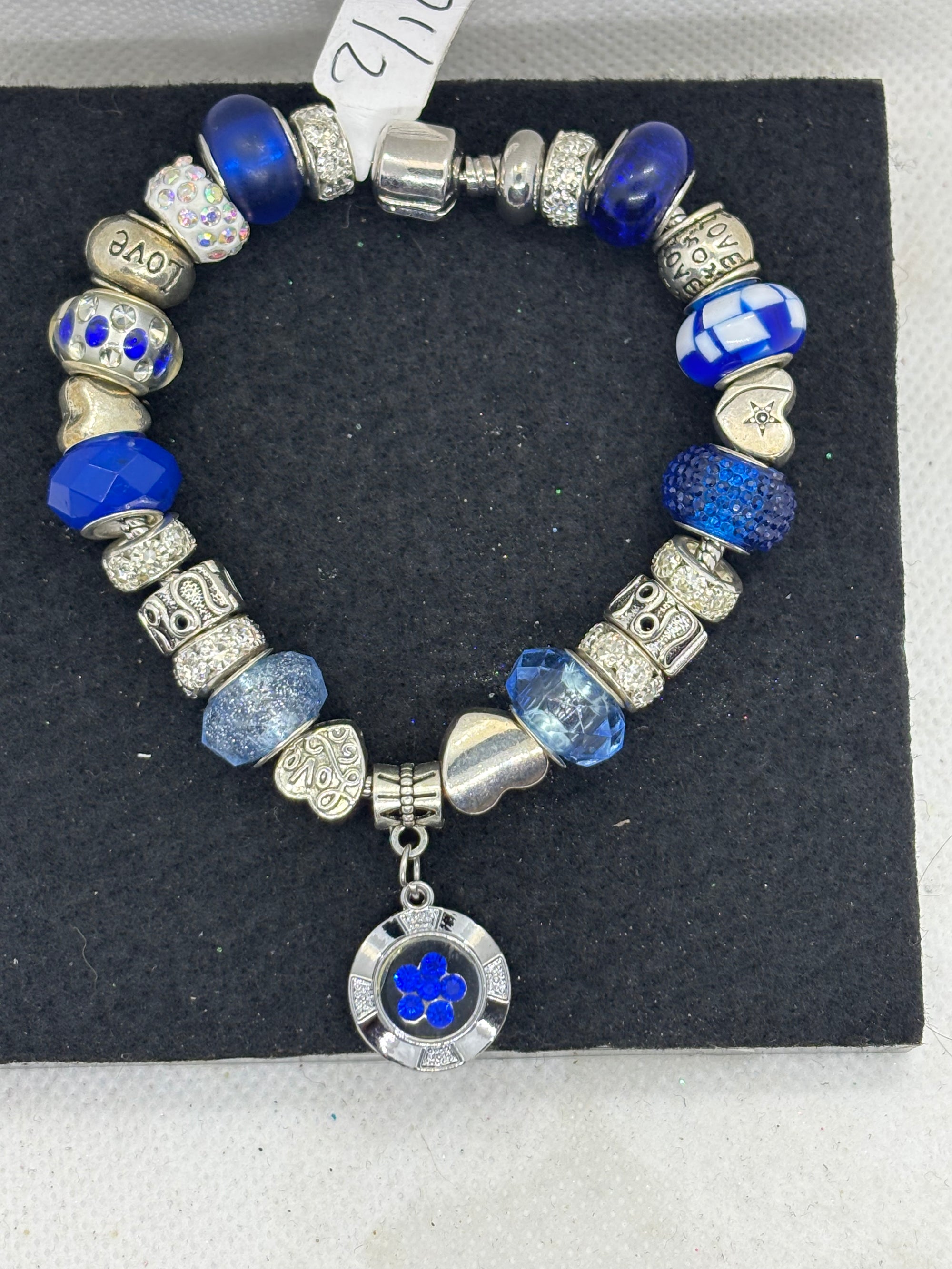Blue Spinning Rhinestone Flower Charm Bracelet
