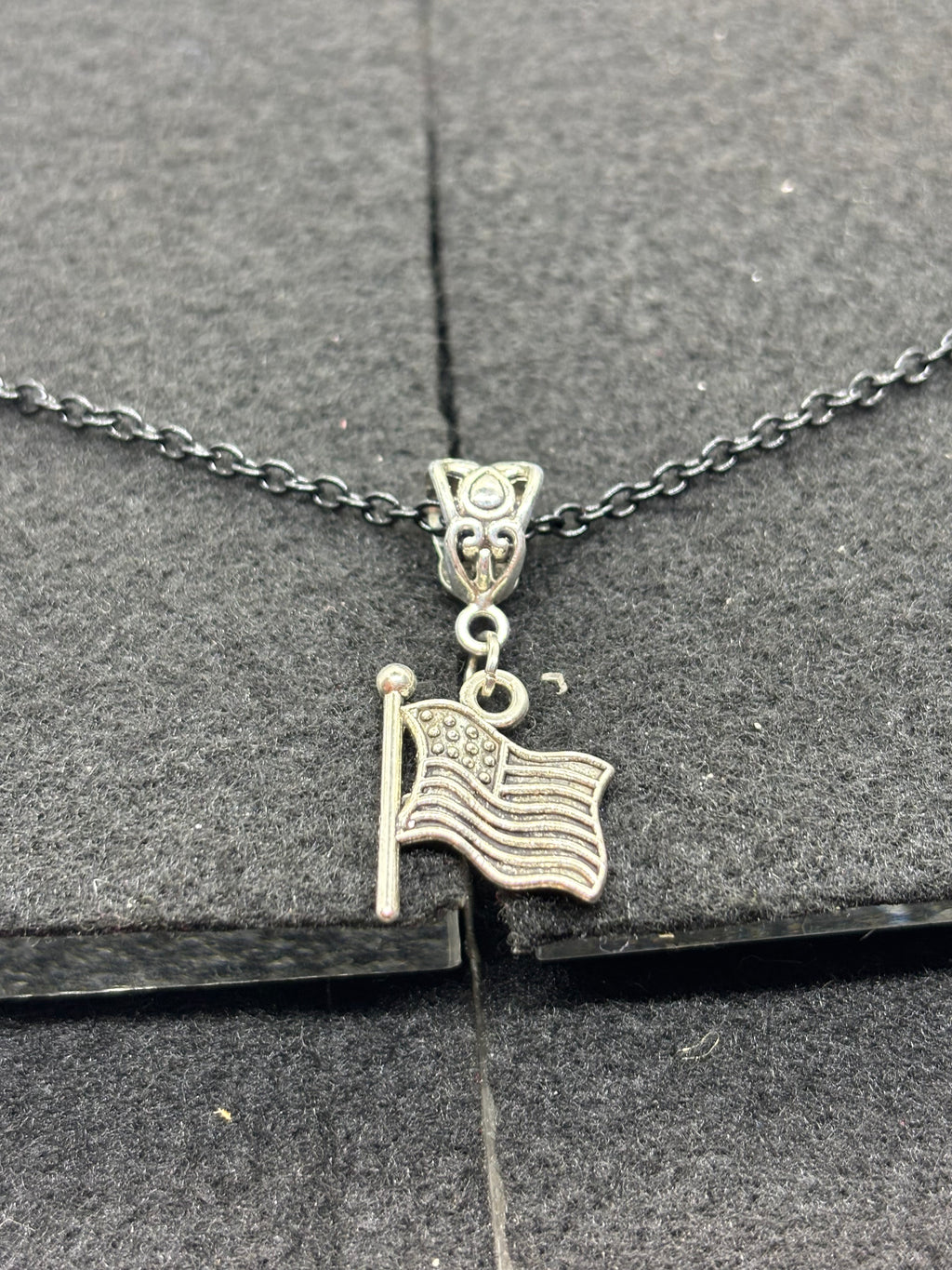 Black Necklace with an American flag Pendant