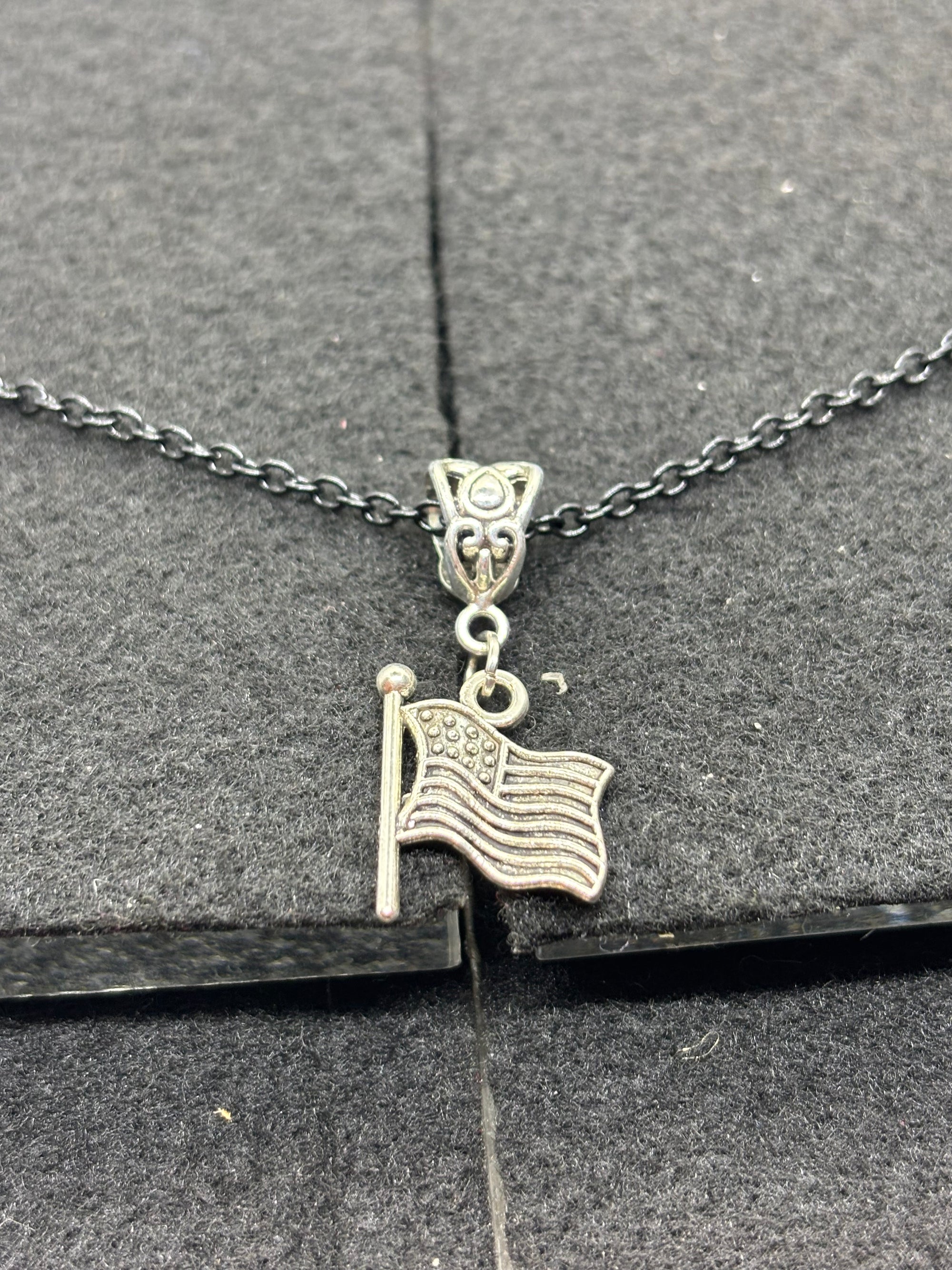 Black Necklace with an American flag Pendant