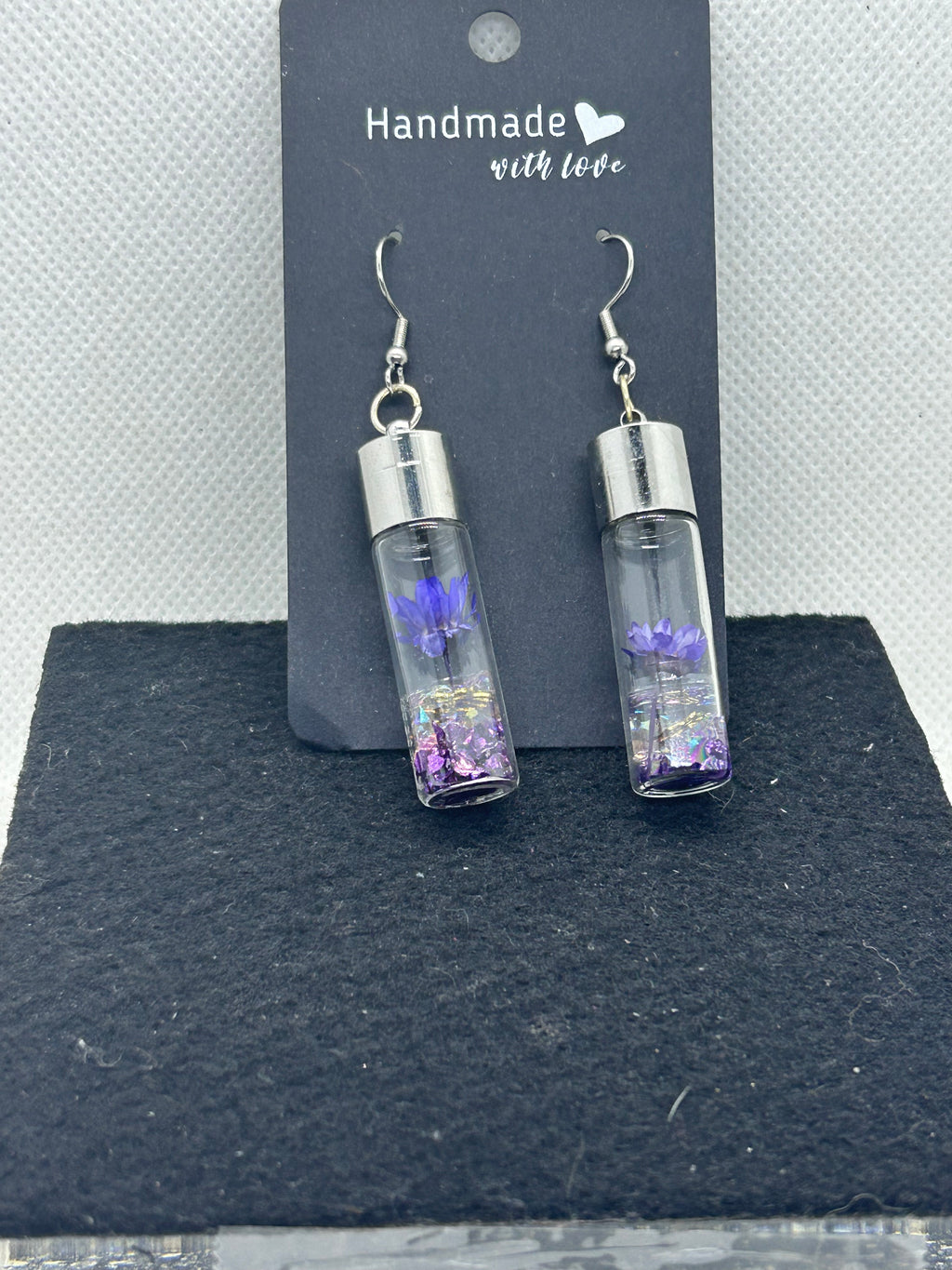 Incased Purple Flowered Earrings