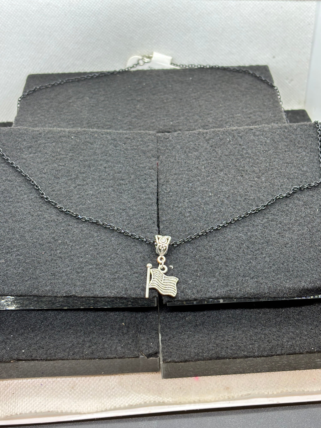 Black Necklace with an American flag Pendant