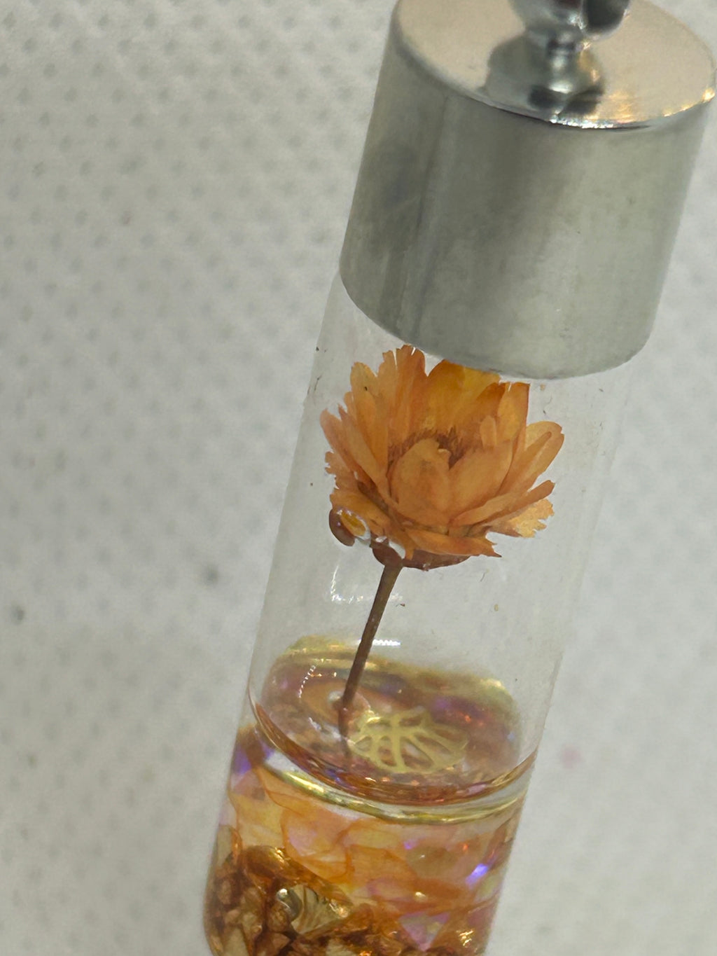 Incased Orange Flower Necklace