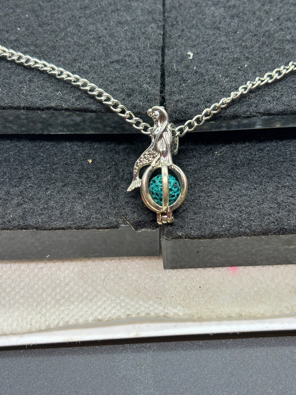 Mermaid with a Caged bead necklace