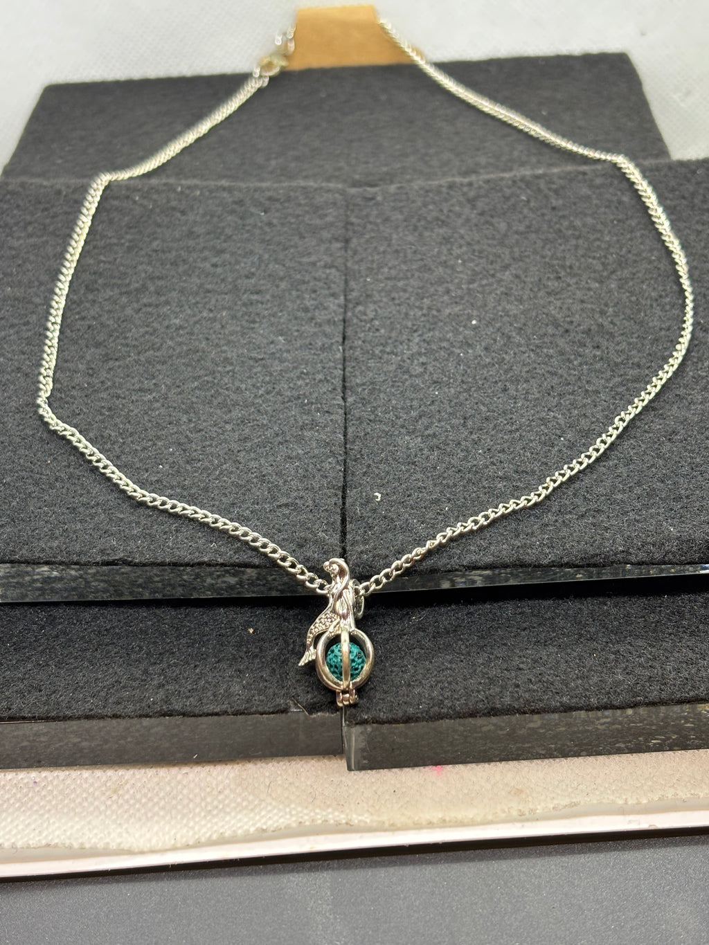 Mermaid with a Caged bead necklace