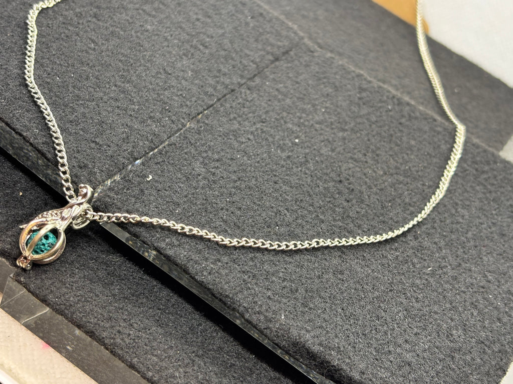 Mermaid with a Caged bead necklace