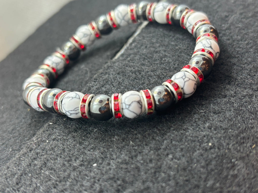 Howl lite and Hematite Beaded Bracelet with red rhinestone spacers