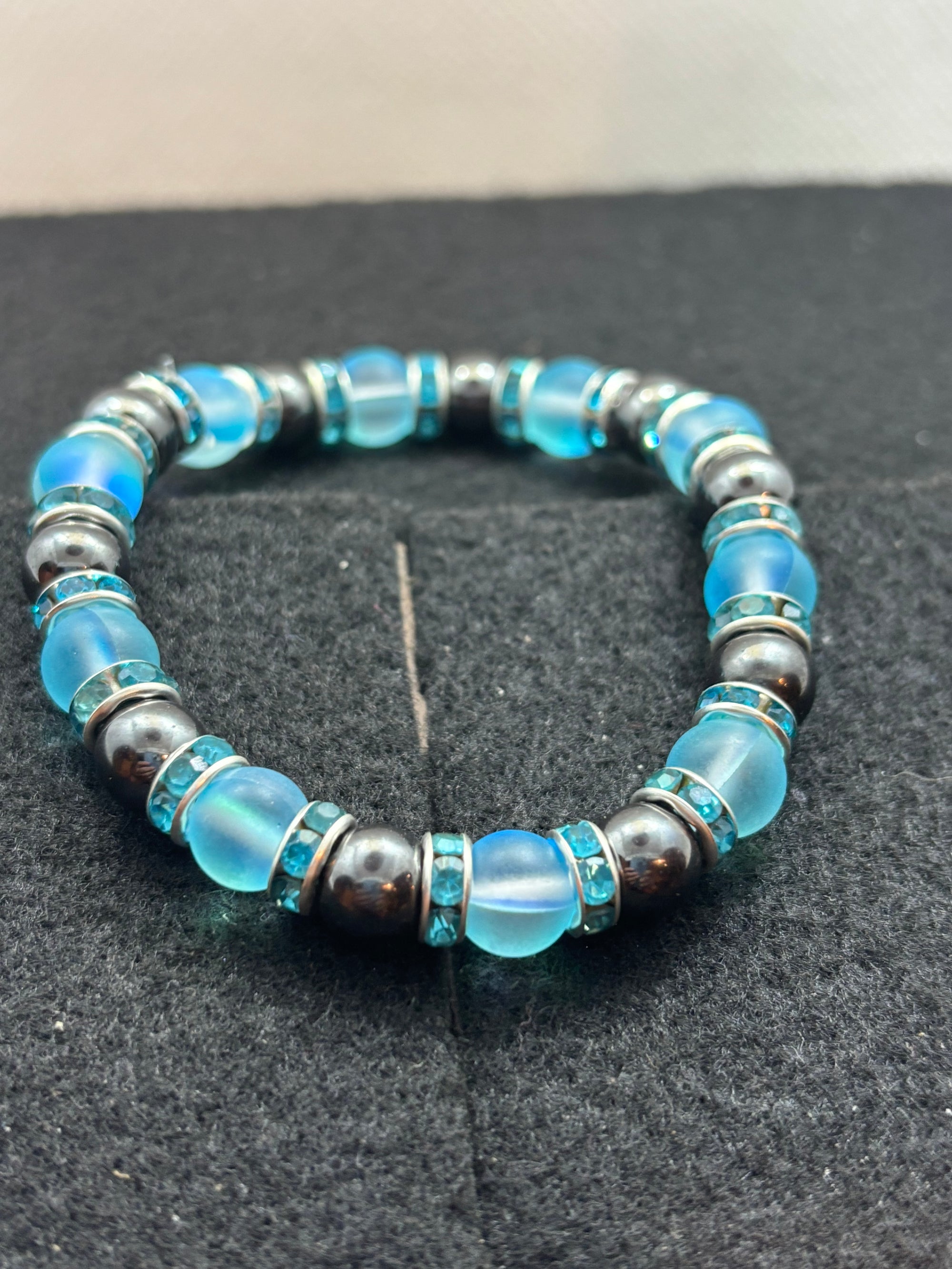 Hematite and Glowing teal mermaid Beaded Bracelet