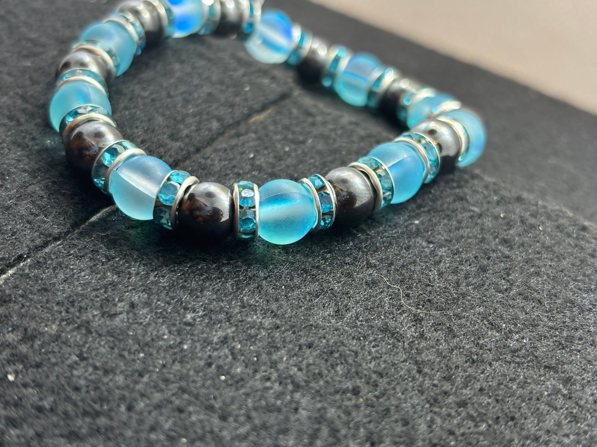 Hematite and Glowing teal mermaid Beaded Bracelet