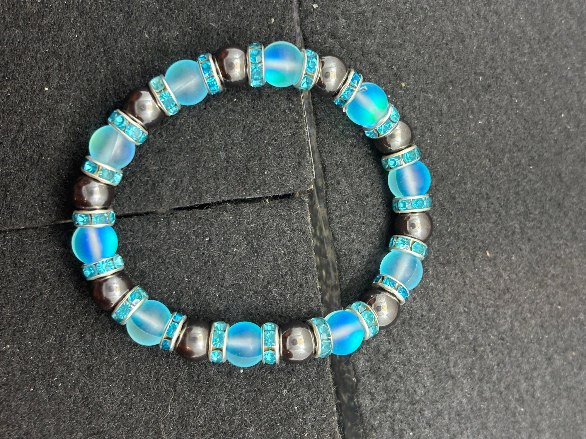 Hematite and Glowing teal mermaid Beaded Bracelet