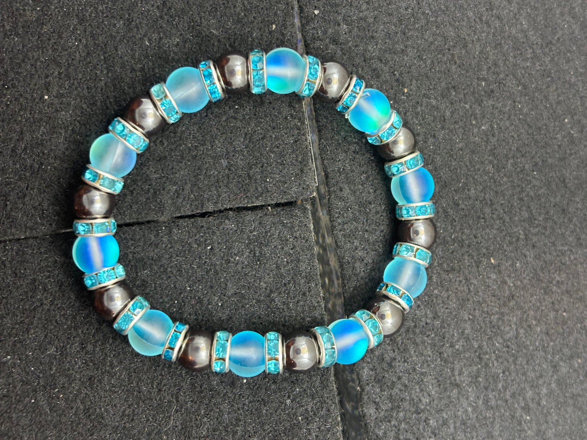 Hematite and Glowing teal mermaid Beaded Bracelet