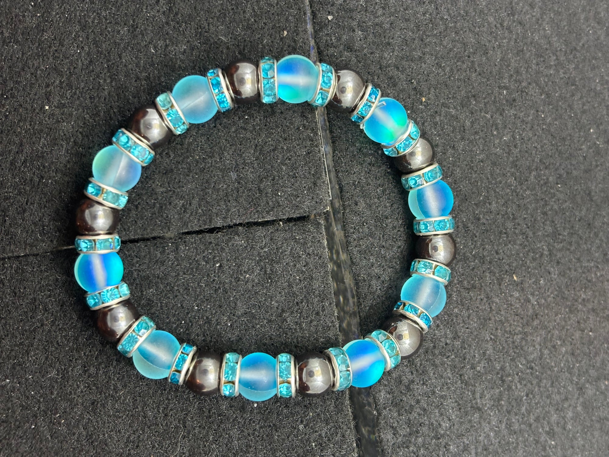Hematite and Glowing teal mermaid Beaded Bracelet
