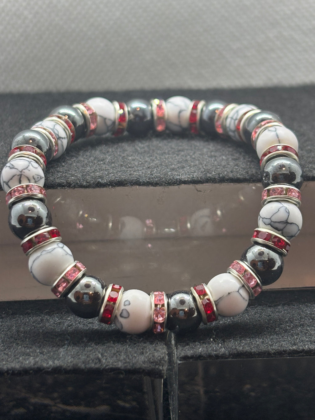 Howl Lite and Hematite Beaded Bracelet with Red Rhinestone spacers