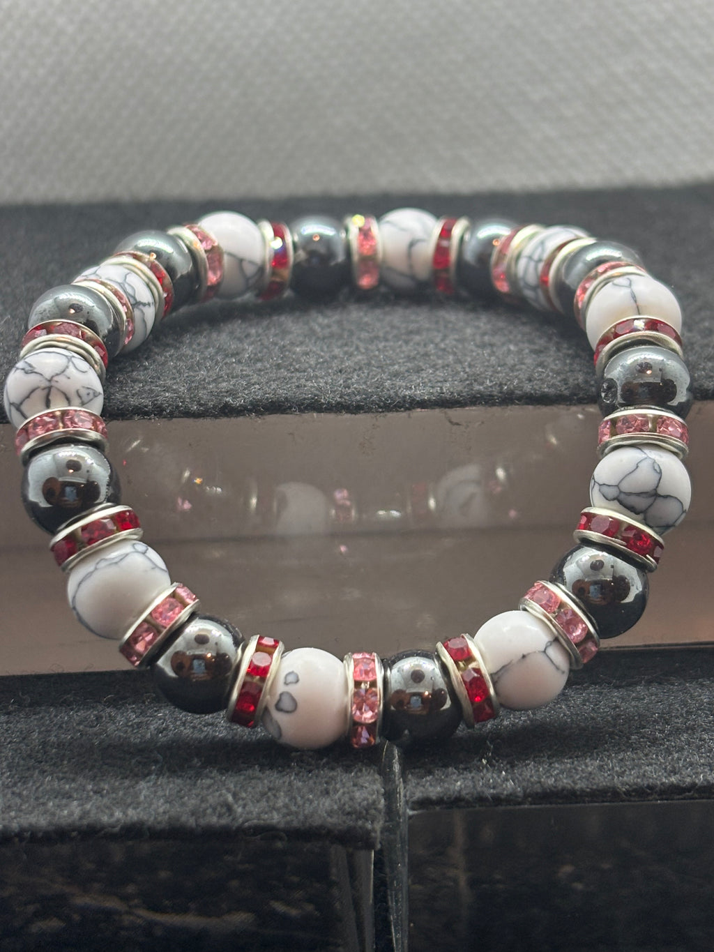 Howl Lite and Hematite Beaded Bracelet with Red Rhinestone spacers