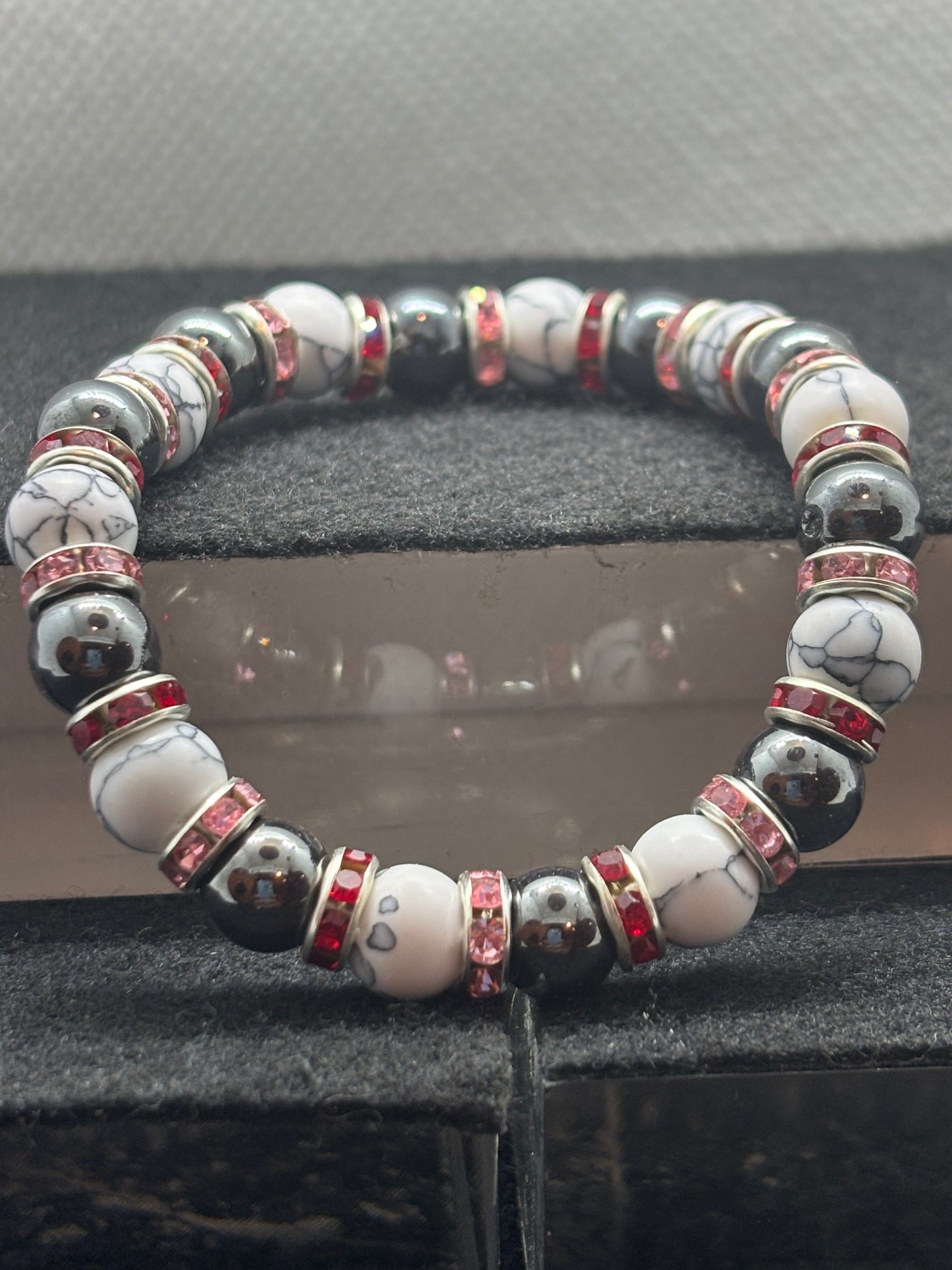 Howl Lite and Hematite Beaded Bracelet with Red Rhinestone spacers