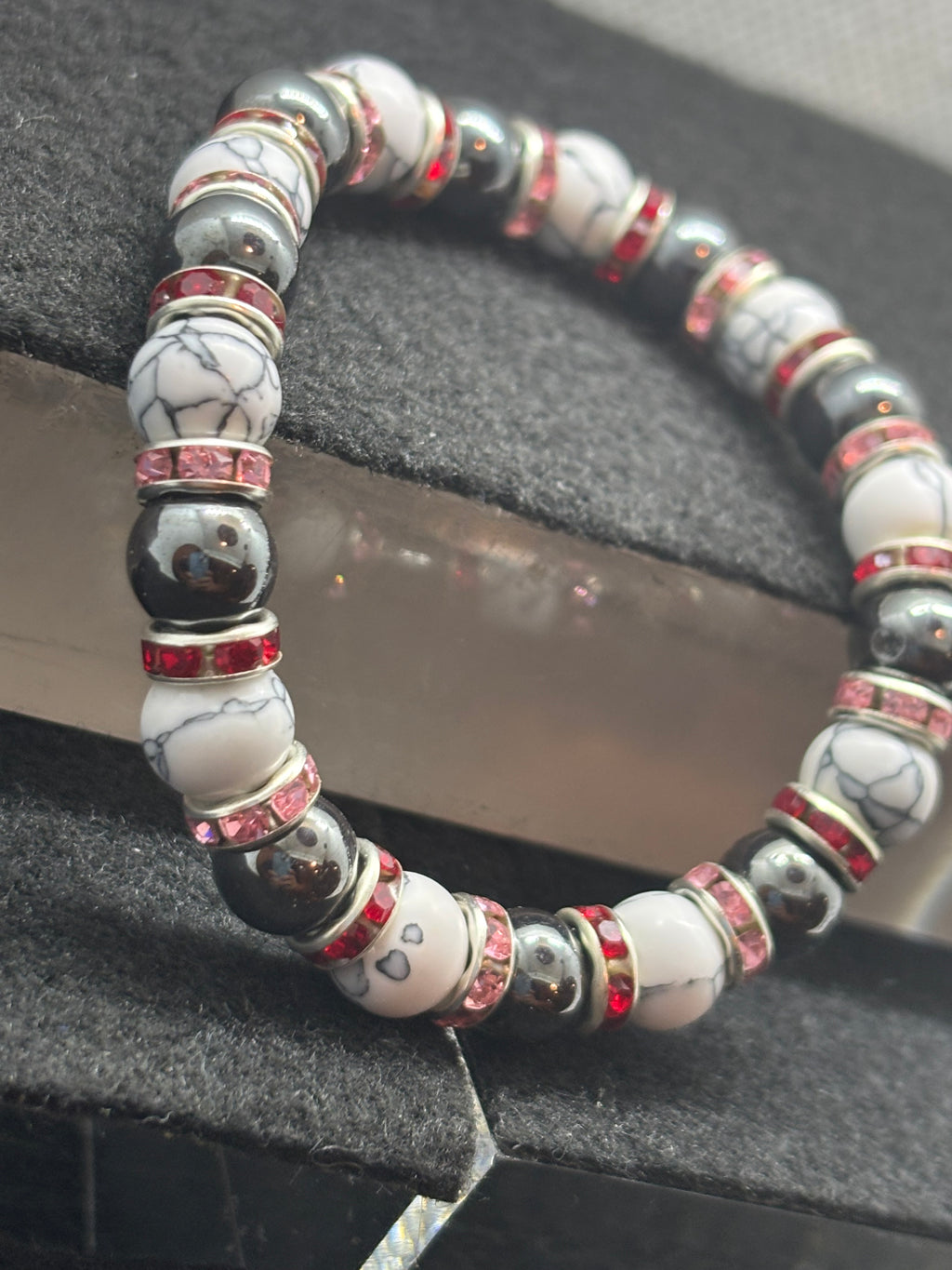 Howl Lite and Hematite Beaded Bracelet with Red Rhinestone spacers