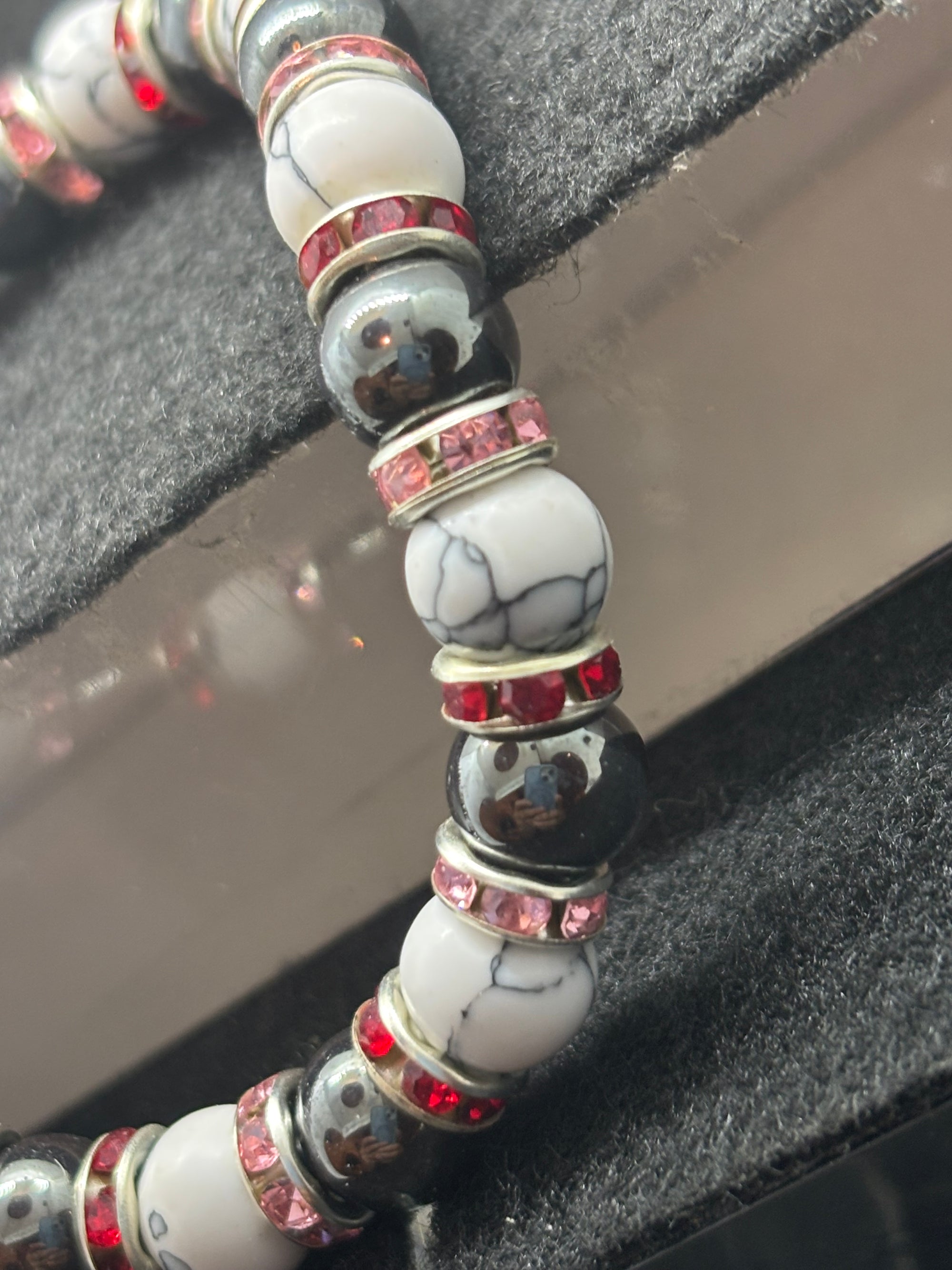 Howl Lite and Hematite Beaded Bracelet with Red Rhinestone spacers
