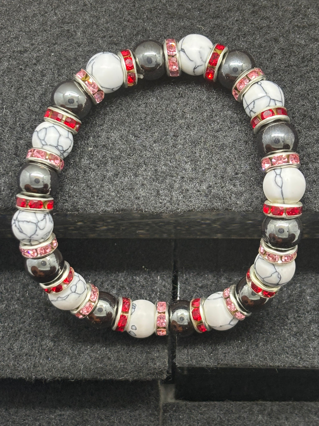 Howl Lite and Hematite Beaded Bracelet with Red Rhinestone spacers