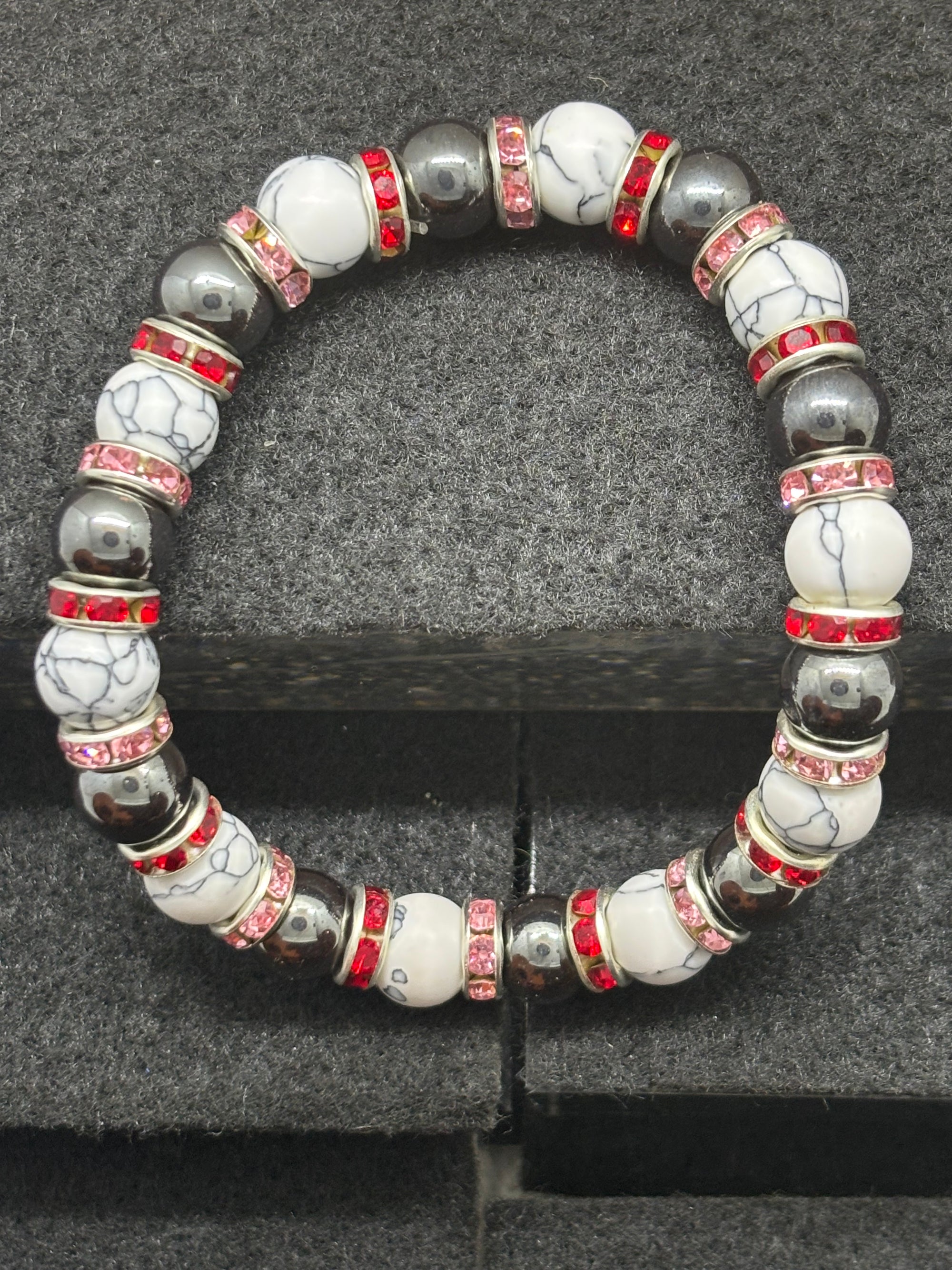 Howl Lite and Hematite Beaded Bracelet with Red Rhinestone spacers