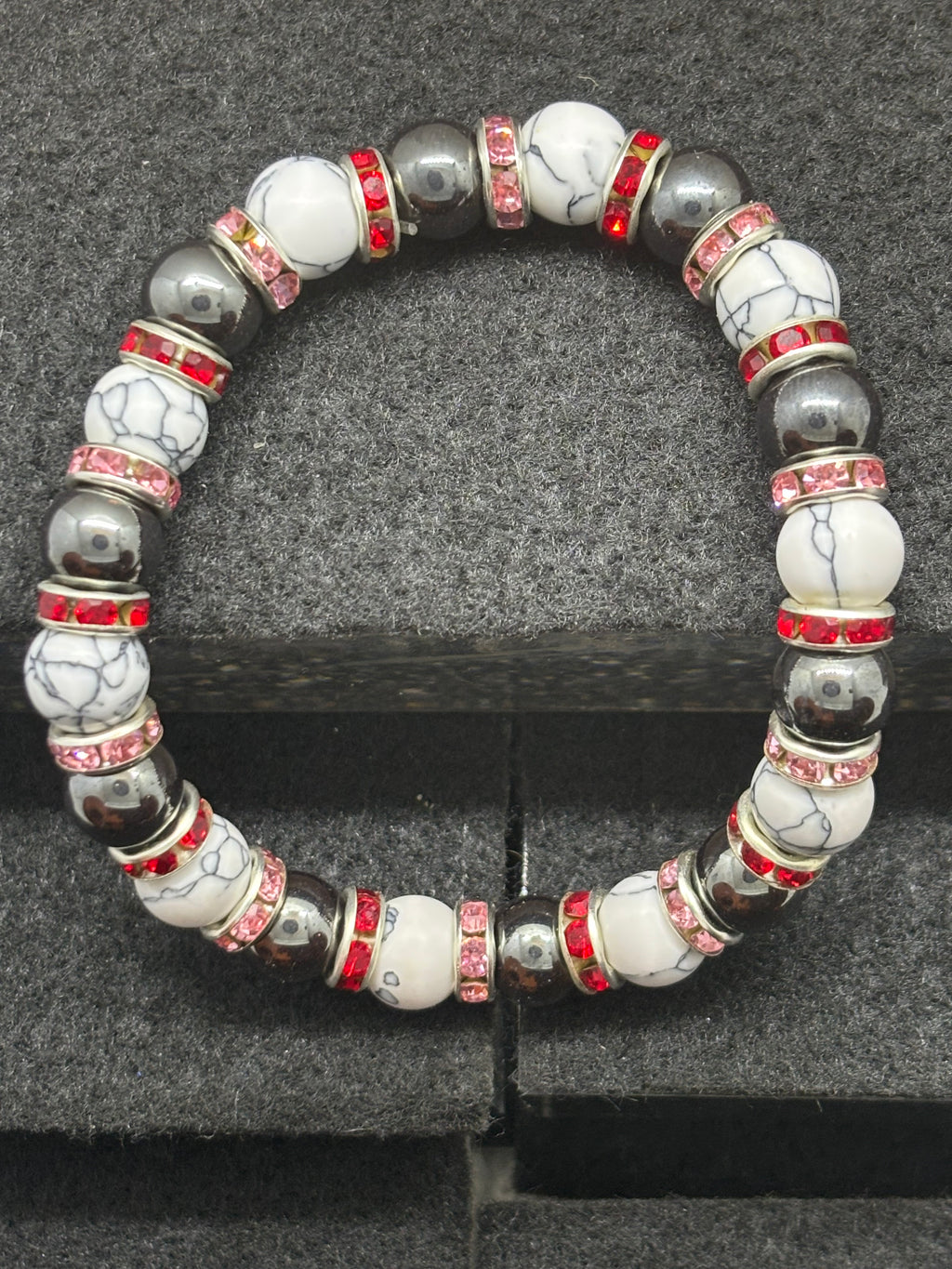 Howl Lite and Hematite Beaded Bracelet with Red Rhinestone spacers