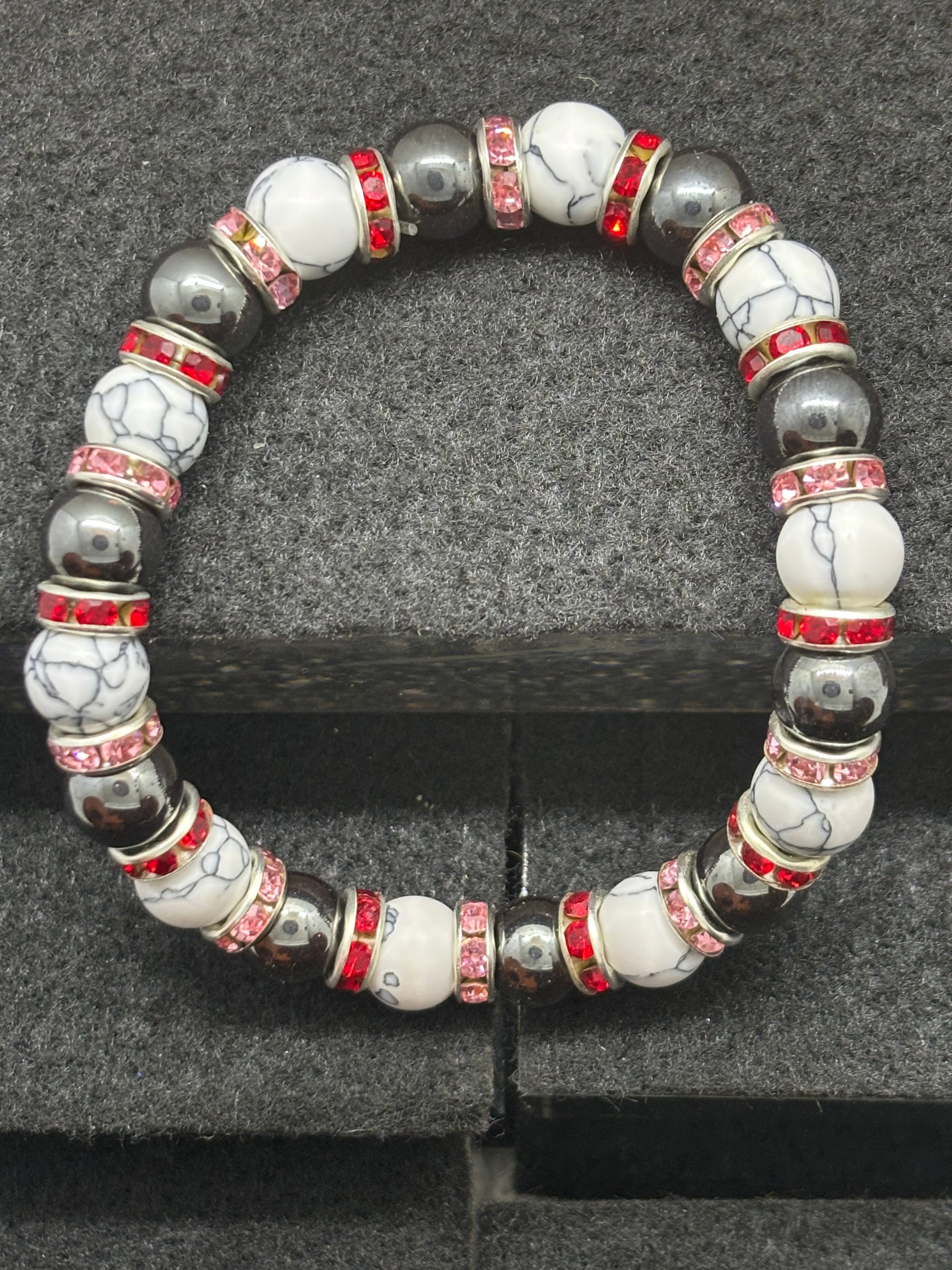 Howl Lite and Hematite Beaded Bracelet with Red Rhinestone spacers
