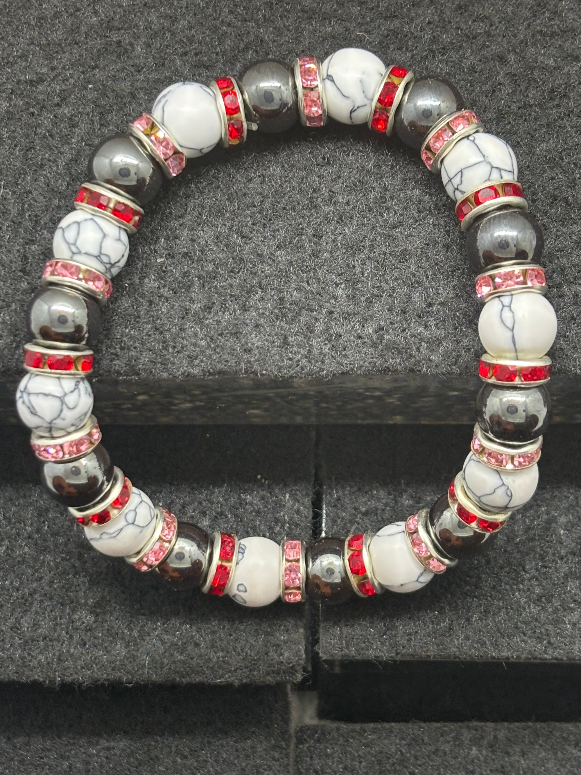 Howl Lite and Hematite Beaded Bracelet with Red Rhinestone spacers